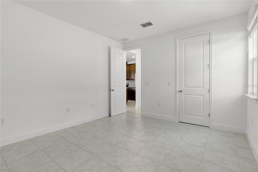 Spacious, unfurnished interior of a new home in Summerdale Park at Lake Nona, Orlando (Image 26).