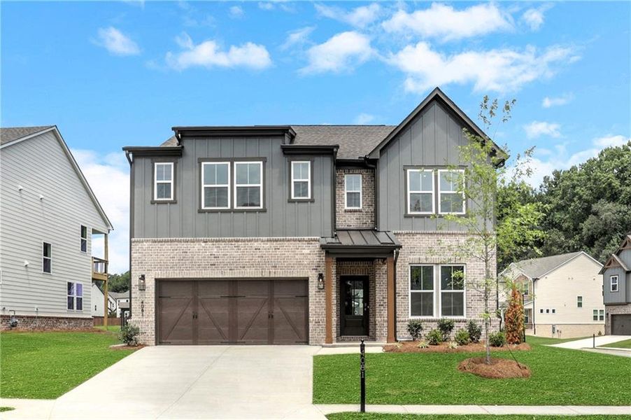 Front exterior of a new home in The Paddocks at Doc Hughes, Buford, GA, highlighting curb appeal (Image 24).