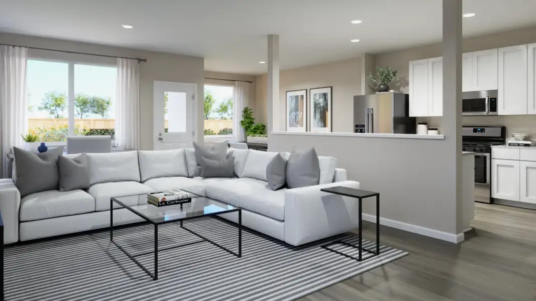 Representative furnished interior of a home built from the The Emerald by Legend Homes in River's Edge, Conroe (Image 7).