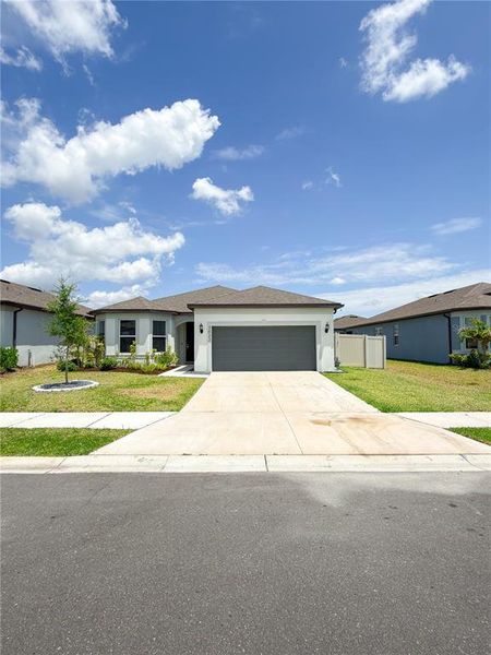Front exterior of a new home in Marwood, Ellenton, FL, highlighting curb appeal (Image 2). Front exterior of a new home in Marwood, Ellenton, FL, highlighting curb appeal (Image 2).