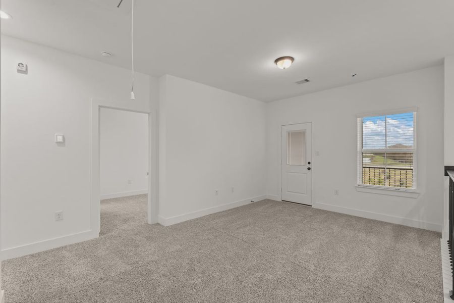 Representative unfurnished interior of a home built from the Sorenstam by Chesmar Homes in Riceland Alley Loads, Mont Belvieu (Image 74).