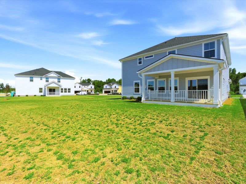 Exterior details and patio area of a home in The Coves at Lakes of Cane Bay, Summerville (Image 3). Exterior details and patio area of a home in The Coves at Lakes of Cane Bay, Summerville (Image 3).