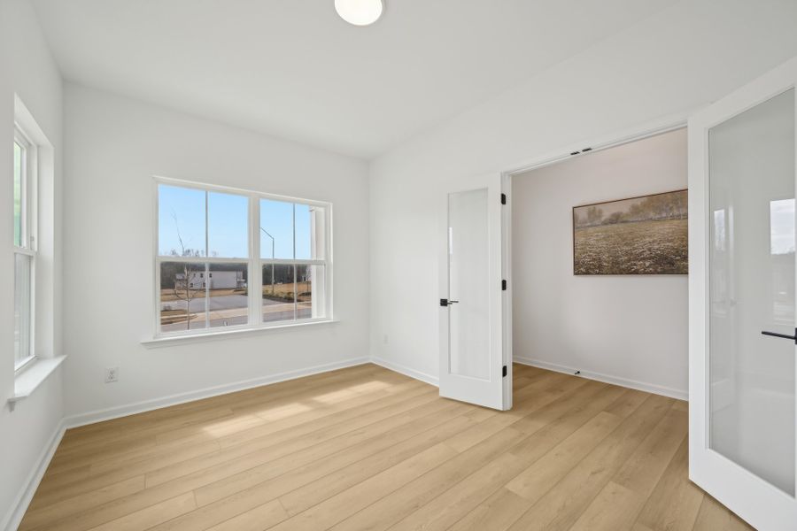 Representative unfurnished interior of a home built from the Leland by Ashton Woods in Rowland's Grant, Fuquay Varina (Image 19).