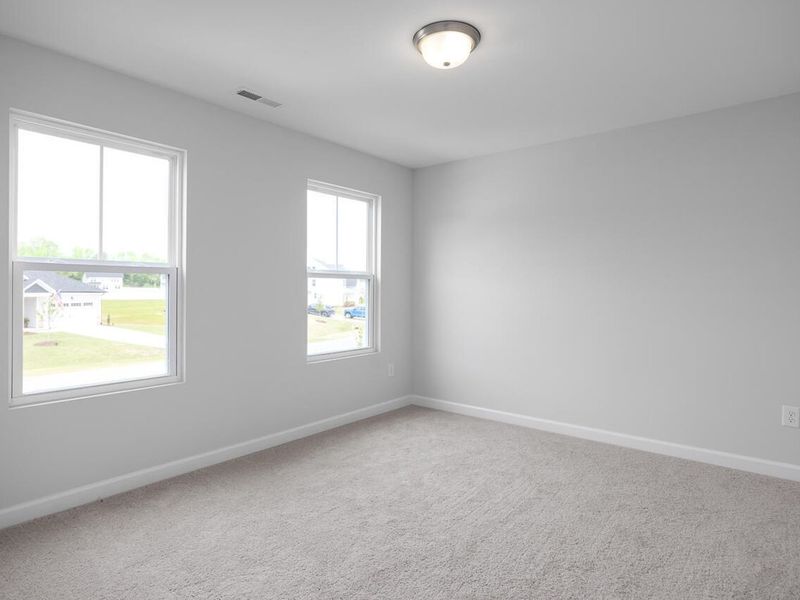 Spacious, unfurnished interior of a new home in Woodland Crossing, Zebulon (Image 22).