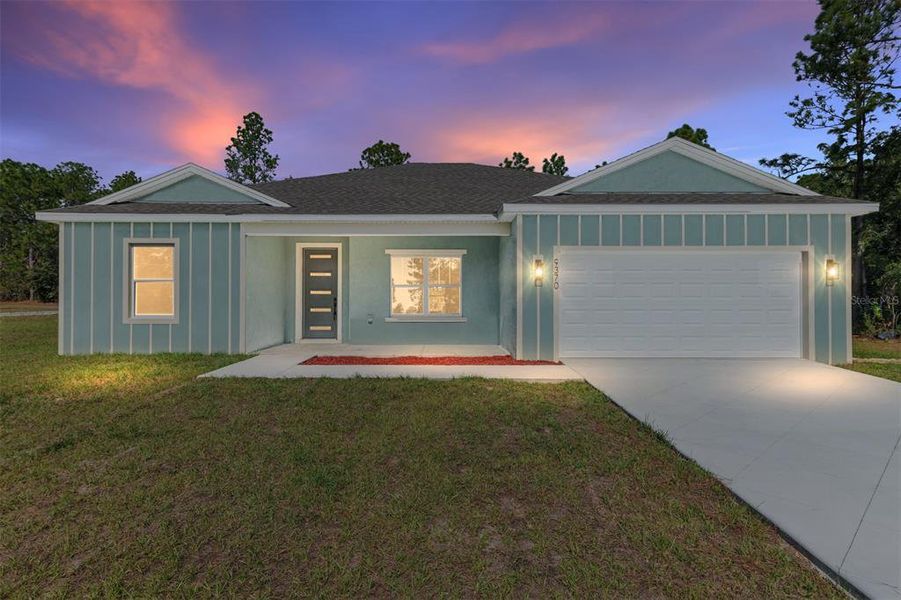 Front exterior of a new home in , Citrus Springs, FL, highlighting curb appeal (Image 20).