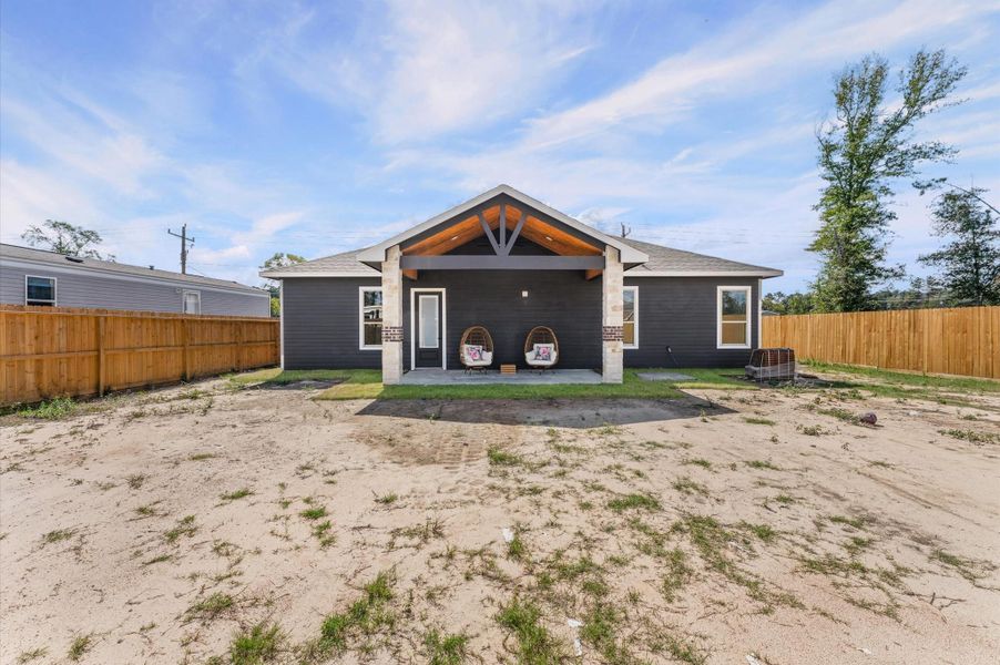 Backyard view shows the depth of the lot—13,999 sq. ft. with endless possibilities for a pool, garden, or workshop. Backyard view shows the depth of the lot—13,999 sq. ft. with endless possibilities for a pool, garden, or workshop.