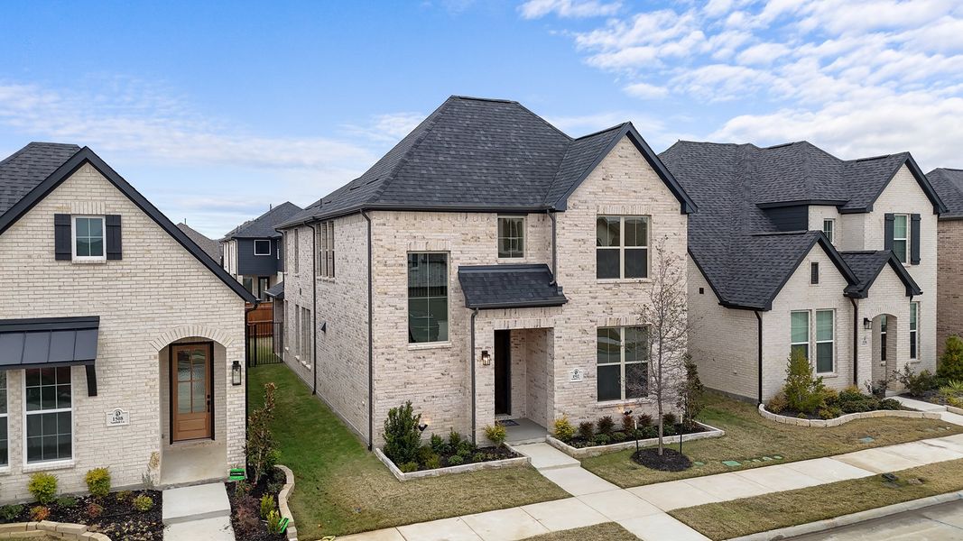 Front exterior of a new home in Cottages of Celina, Celina, TX, highlighting curb appeal (Image 2). Front exterior of a new home in Cottages of Celina, Celina, TX, highlighting curb appeal (Image 2).