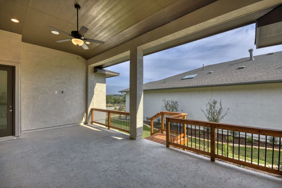 Exterior details and patio area of a home in El Sonido at Campanas, San Antonio (Image 25).