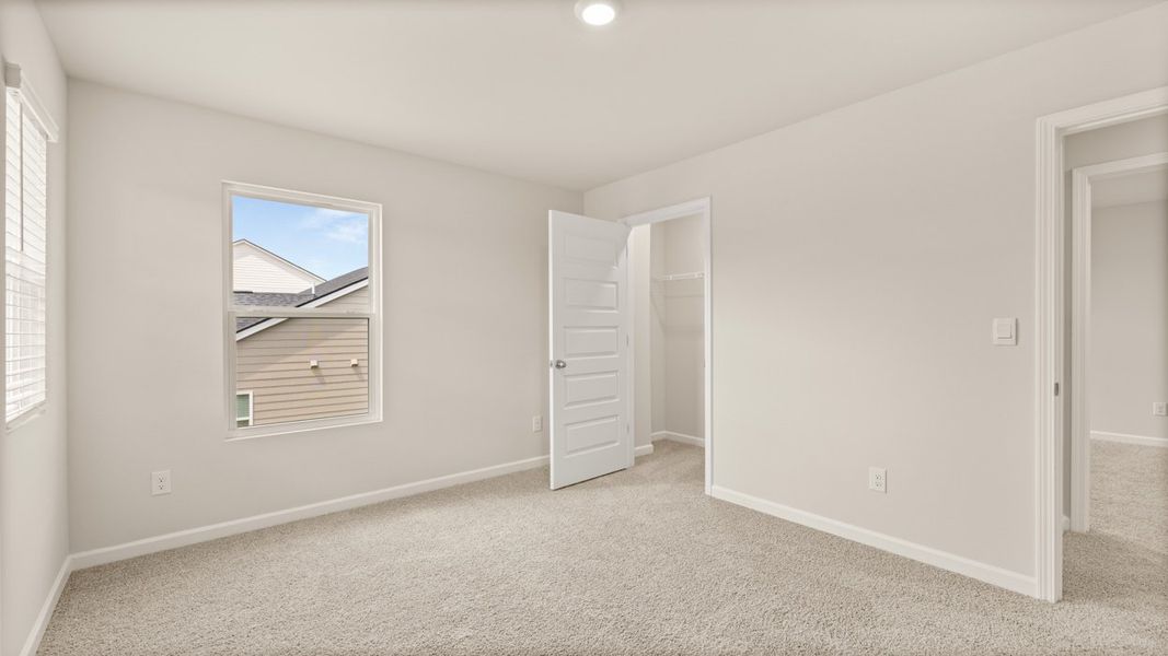 Representative unfurnished interior of a home built from the Elle by D.R. Horton in Preserve at Dove Creek, Statham (Image 28).