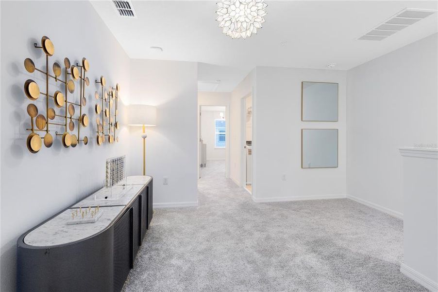 Furnished interior view inside a new home in The Cove at Nona Sound, Orlando (Image 28). Furnished interior view inside a new home in The Cove at Nona Sound, Orlando (Image 28).
