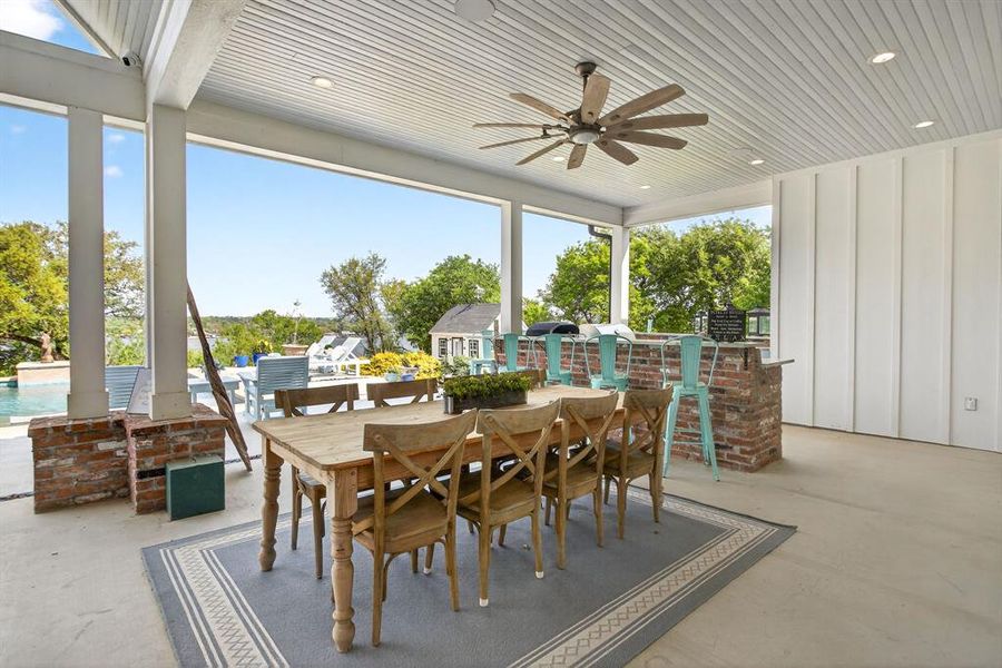 Bring the dinner party outside as this outdoor dining area can accommodate very large groups!