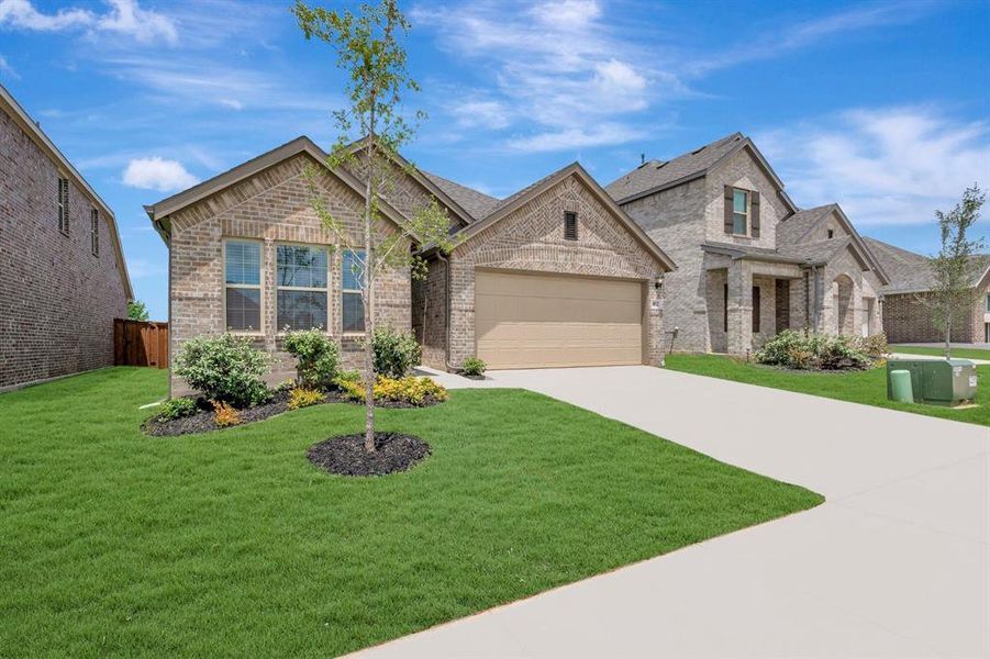 Front exterior of a new home in Tarrytown, Crowley, TX, highlighting curb appeal (Image 23). Front exterior of a new home in Tarrytown, Crowley, TX, highlighting curb appeal (Image 23).