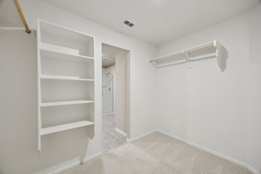 Primary Closet in the Harper home plan by Trophy Signature Homes – REPRESENTATIVE PHOTO