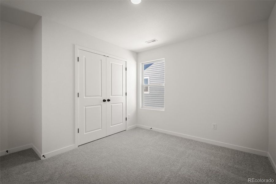 Spacious, unfurnished interior of a new home in Revel Crossing at Wolf Ranch – The Ascent Collection, Colorado Springs (Image 23).