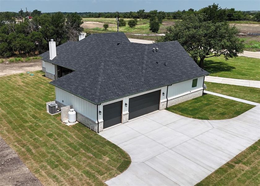 Front exterior of a new home in , Weatherford, TX, highlighting curb appeal (Image 35).