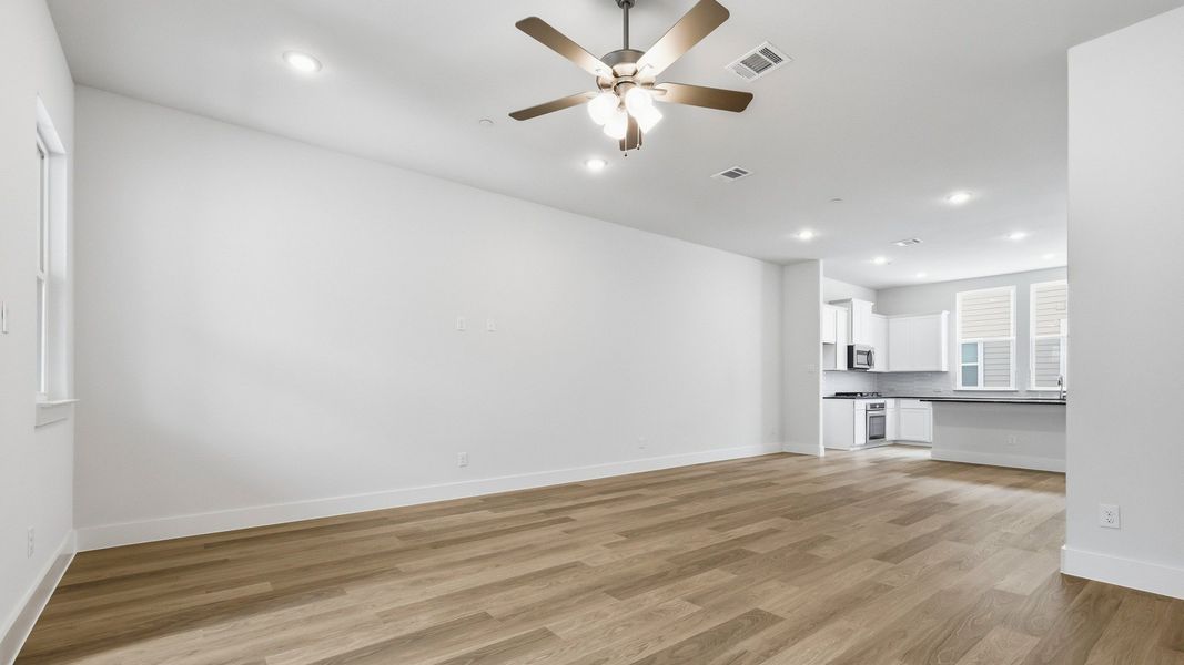 Furnished interior view inside a new home in Collin Creek, Plano (Image 15).