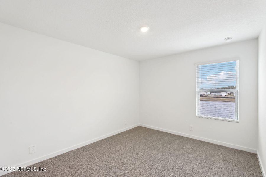 Spacious, unfurnished interior of a new home in Lakes at Bella Lago - Signature Series, Green Cove Springs (Image 37). Spacious, unfurnished interior of a new home in Lakes at Bella Lago - Signature Series, Green Cove Springs (Image 37).