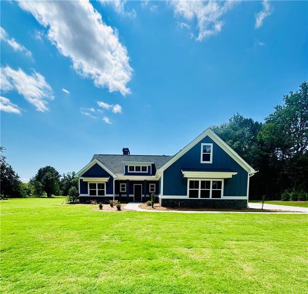 Front exterior of a new home in , Covington, GA, highlighting curb appeal (Image 20).