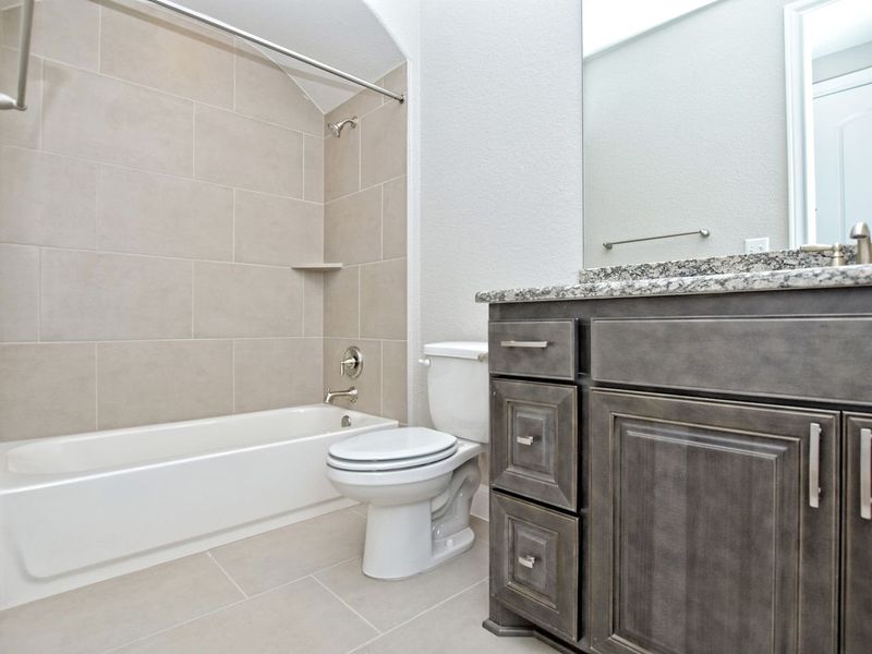 Representative furnished interior of a home built from the Coronado I by Giddens Homes in Clearwater Ranch, Liberty Hill (Image 8).