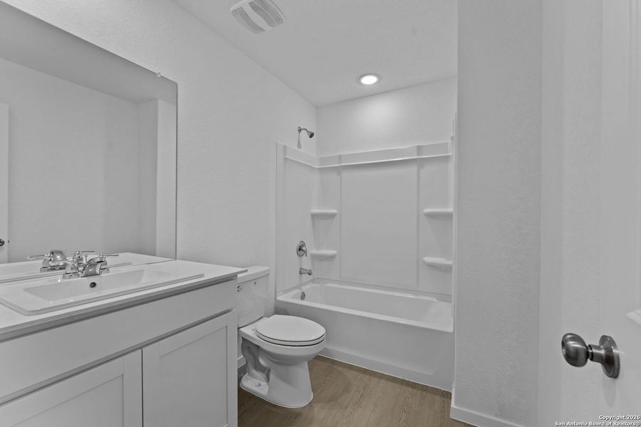 Furnished interior view inside a new home in Voss Farms, New Braunfels (Image 4).