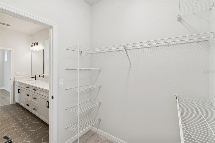 Spacious, unfurnished interior of a new home in Laureate Park at Lake Nona - Garden Series, Orlando (Image 32).