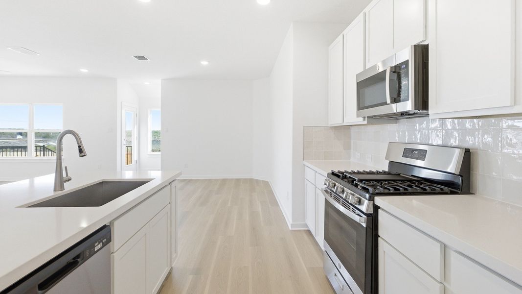 Furnished interior view inside a new home in Sky Ridge, San Marcos (Image 8).