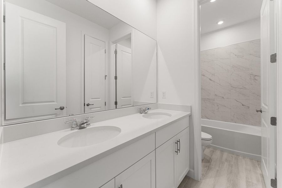 Furnished interior view inside a new home in Tradition - Kenley, Port St. Lucie (Image 5).