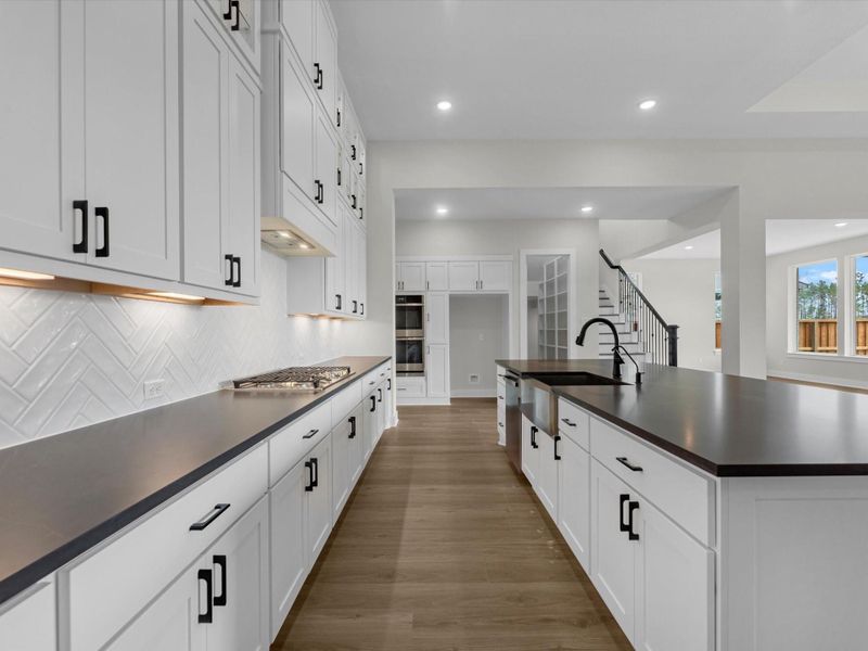 Furnished interior view inside a new home in Woodson’s Reserve, Spring (Image 12).