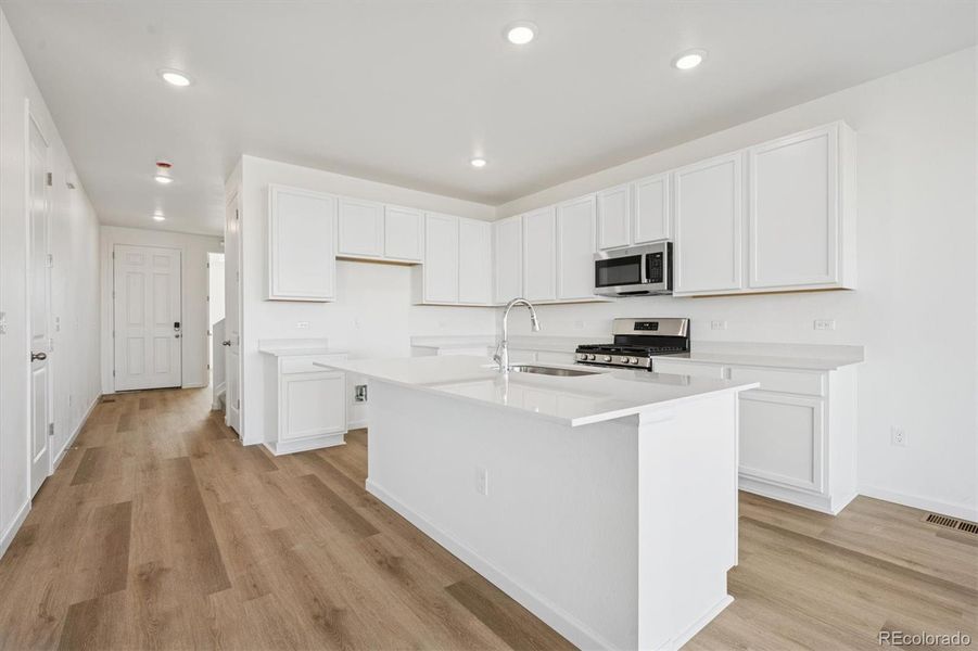 Furnished interior view inside a new home in Vista West, Keenesburg (Image 9).