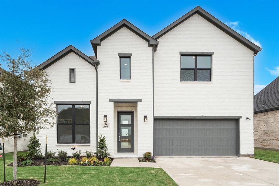 Front exterior of a new home in Devonshire, Forney, TX, highlighting curb appeal (Image 2). Front exterior of a new home in Devonshire, Forney, TX, highlighting curb appeal (Image 2).