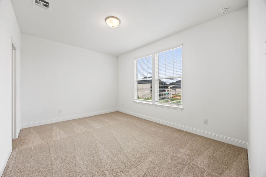Representative unfurnished interior of a home built from the Kelly by Cambridge Homes in Lake Park, Rowlett (Image 24).
