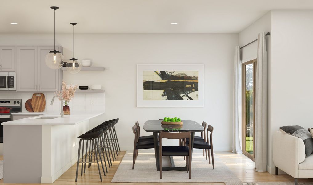 Dining area with sliding door to the covered patio