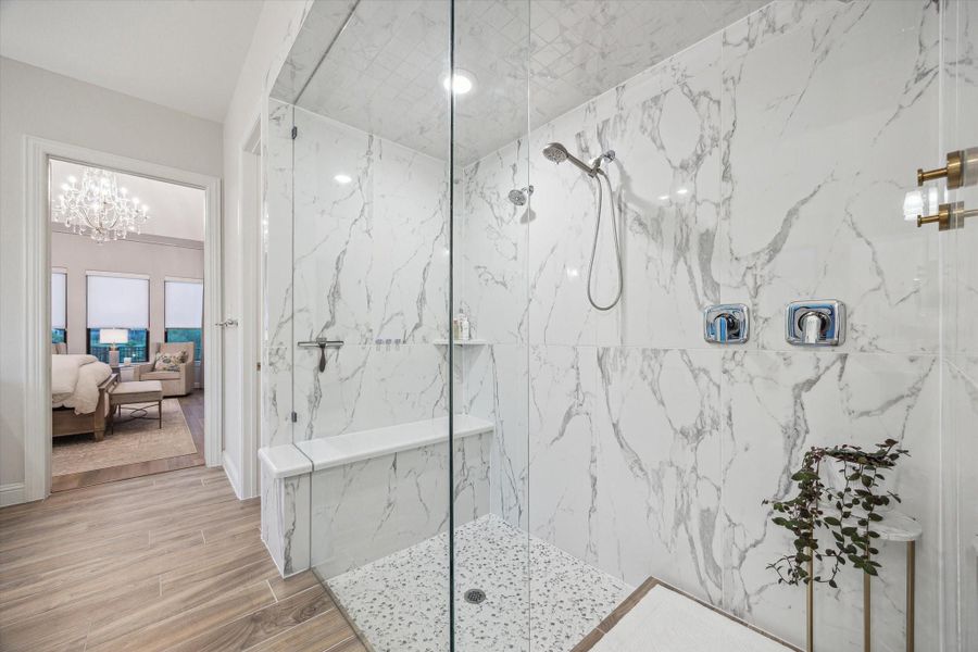 Extended shower with double shower heads and bench Extended shower with double shower heads and bench