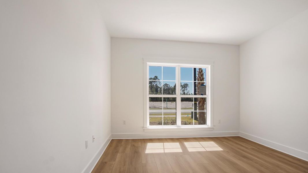 Representative unfurnished interior of a home built from the Lily by D.R. Horton in Breakfast Point East Phase II, Panama City Beach (Image 24).