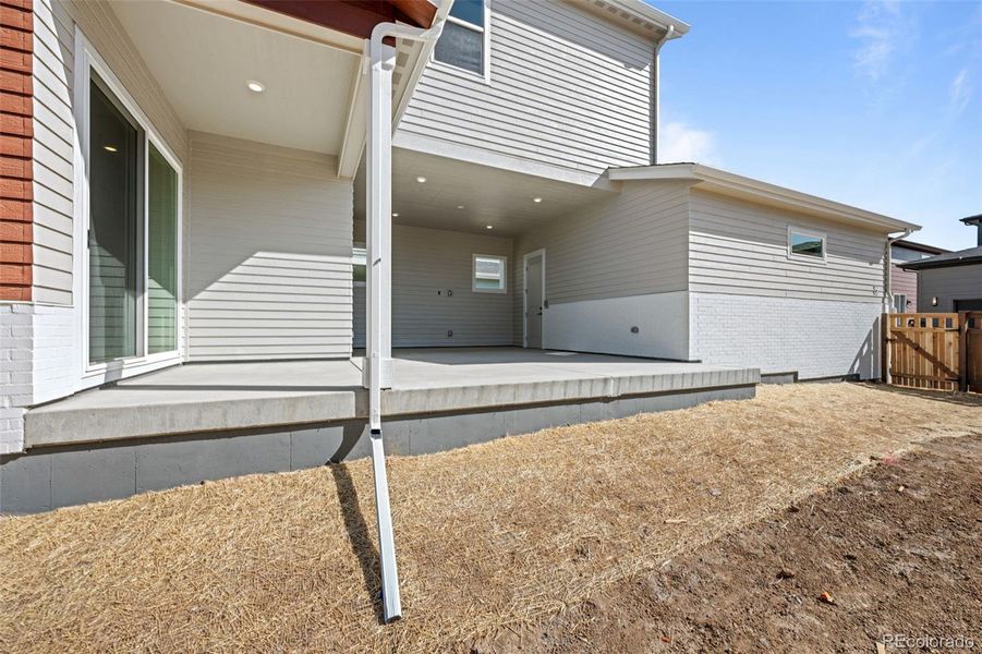 Front exterior of a new home in Painted Prairie, Aurora, CO, highlighting curb appeal (Image 2).