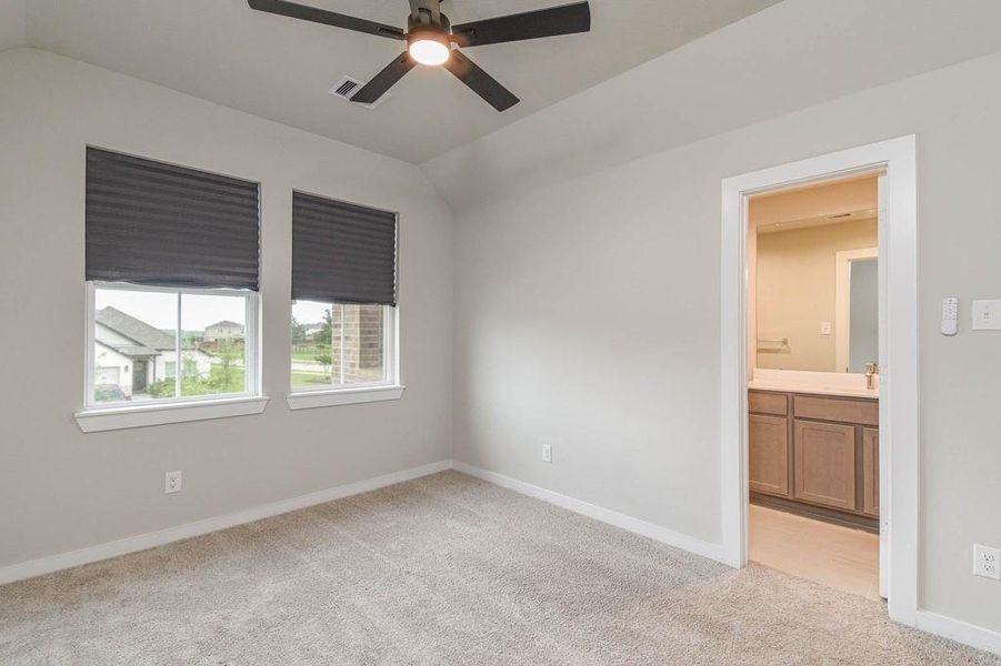 Guest bedroom with its own bathroom.
