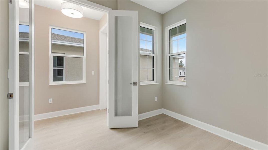 Spacious, unfurnished interior of a new home in Cresswind DeLand, Deland (Image 18).