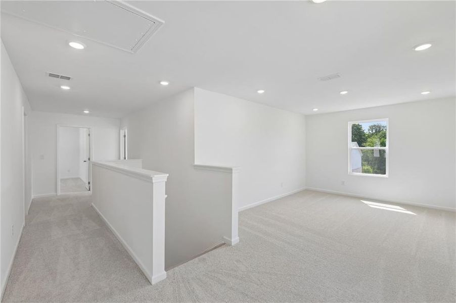 Spacious, unfurnished interior of a new home in Windance Lake, Loganville (Image 35).