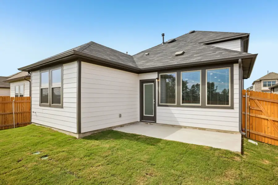 Exterior details and patio area of a home in Trinity Ranch, Elgin (Image 24).
