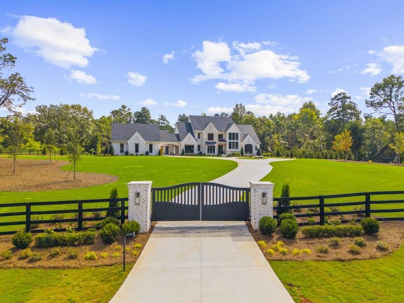 Front exterior of a new home in , Alpharetta, GA, highlighting curb appeal (Image 25).