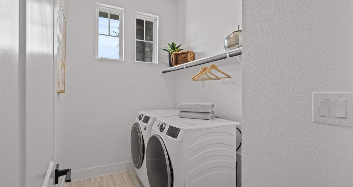 Furnished interior view inside a new home in 6 Creeks, Kyle (Image 14).