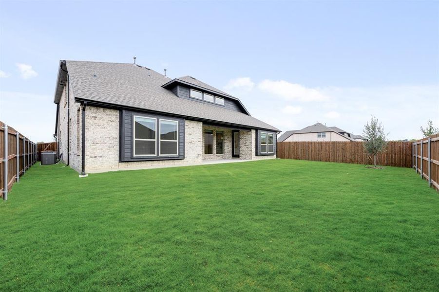 Exterior details and patio area of a home in Wildflower Ranch 60-65, Fort Worth (Image 4). Exterior details and patio area of a home in Wildflower Ranch 60-65, Fort Worth (Image 4).