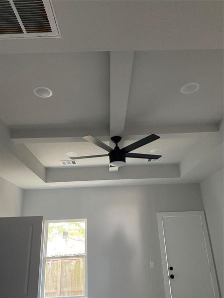 view of the tray ceiling in the primary bedroom view of the tray ceiling in the primary bedroom