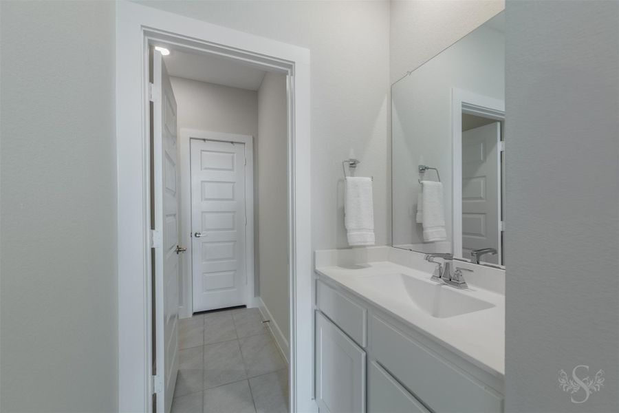 Private vanity area adds convenience to the upstairs accommodations with abundant counter space and a large mirror. Its modern finishes create a clean, upscale presentation. Private vanity area adds convenience to the upstairs accommodations with abundant counter space and a large mirror. Its modern finishes create a clean, upscale presentation.