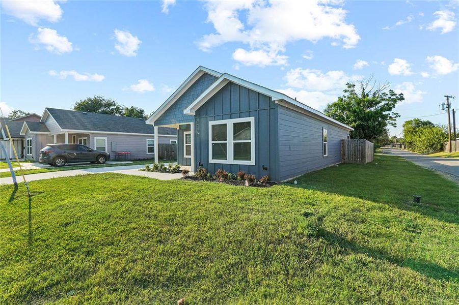 Front exterior of a new home in , Dallas, TX, highlighting curb appeal (Image 18).