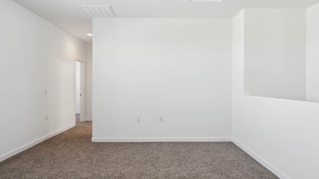 Representative unfurnished interior of a home built from the Mitchell by D.R. Horton in Upper Canyon, Phoenix (Image 28).