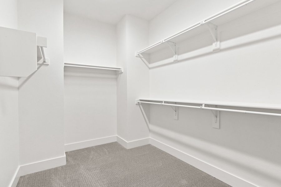 Spacious, unfurnished interior of a new home in The Tribute, The Colony (Image 36).