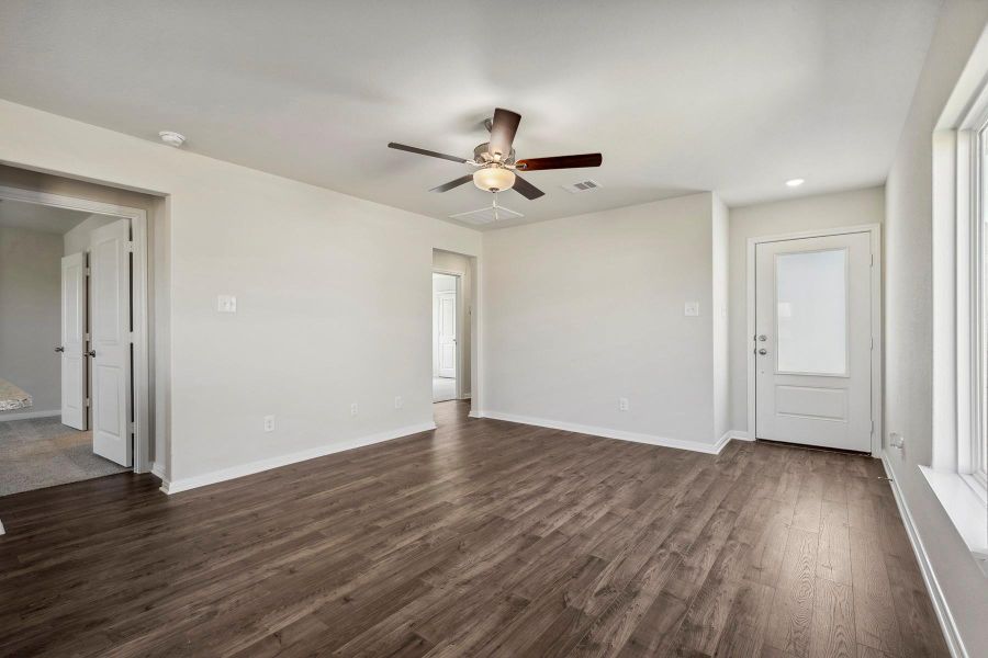 Spacious, unfurnished interior of a new home in Vacek Country Meadows, Richmond (Image 10).