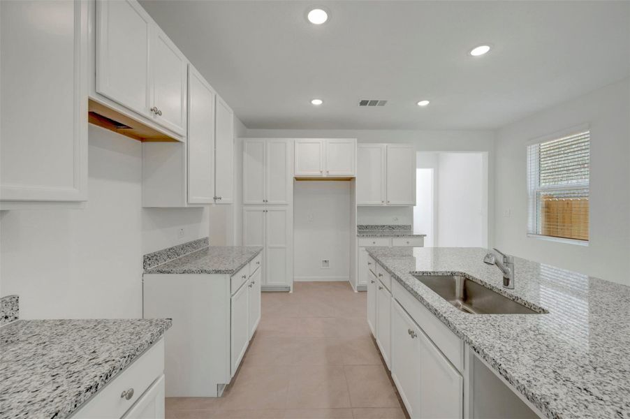 Lovely kitchen with granite counters Lovely kitchen with granite counters