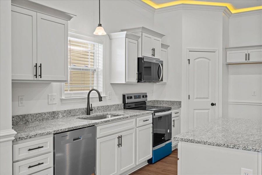 Furnished interior view inside a new home in Mills Gin, Campobello (Image 5).